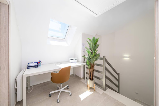 Baby cot prepared in a bright room